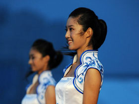 Victory ceremony hostesses are ready for another ceremony in Qingdao, Shandong Province August 17, 2008.