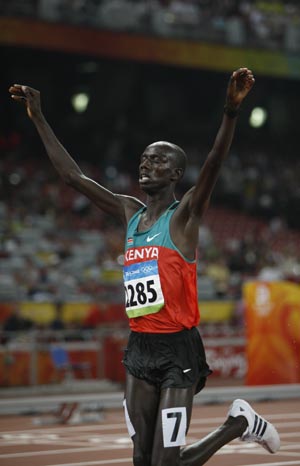 Brimin Kiprop Kipruto of Kenya celebrates after the men's 3000m steeplechase final at the National Stadium, also known as the Bird's Nest, during Beijing 2008 Olympic Games in Beijing, China, Aug. 18, 2008. Brimin Kiprop Kipruto won the gold.(Xinhua Photo)