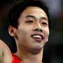 China's Zou Kai wins the horizontal bar gold medal
