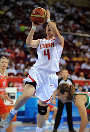 Song Xiaoyun of China shoots during the match China VS Belarus in women's quartefinal of the Beijing 2008 Olympic Games Basketball event in Beijing, China, Aug. 19, 2008. China beat Belarus 77-62 and qualified the next round.