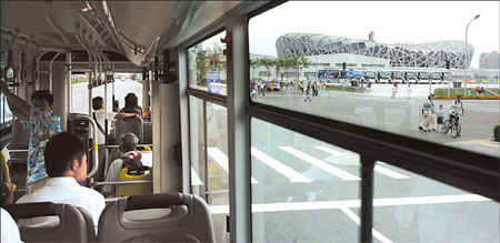 Among the sights seen by riders on special Olympics Bus No 1 is the Bird's Nest and cauldron. [China Daily] 
