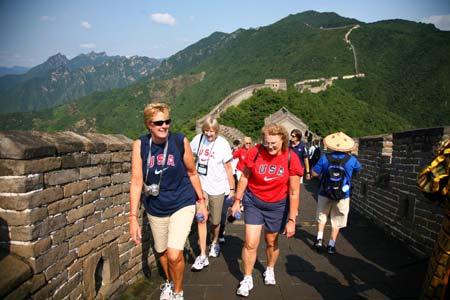 Foreign visitors climb the Mutianyu section of the Great Wall in Beijing, capital of China, Aug. 18, 2008. The Great Wall attracts many foreign visitors and athletes during the Beijing 2008 Olympic Games. 
