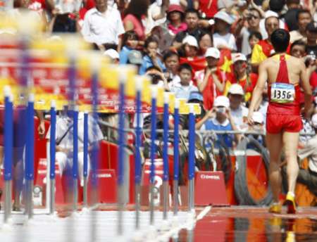 Liu Xiang quits men&apos;s 110m hurdles on August 18, 2008 at Beijing Olympic Games. 