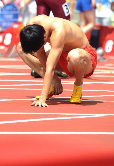 Liu Xiang quits men&apos;s 110m hurdles on August 18, 2008 at Beijing Olympic Games. 