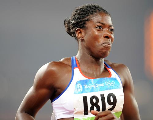 Britain's Christine Ohuruogu captured the gold medal of the women's 400 meters in 49.62 seconds at the Beijing Olympic Games on Tuesday. [Xinhua] 