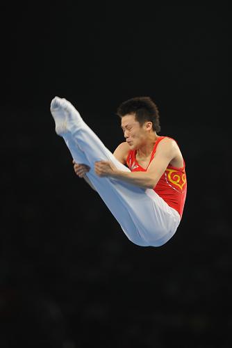 China's Lu Chunlong competes during trampoline men's final of Beijing 2008 Olympic Games at National Indoor Stadium in Beijing.