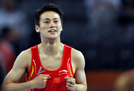 Lu Chunlong of China became the first Chinese man to win an Olympic title in Gymnastics Trampoline, in the Men's final at the National Indoor Stadium on August 19, 2008. [XInhua]