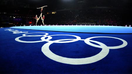 Chinese gymnasts perform during a gymnastics artistic gala of the Beijing 2008 Olympic Games at the National Indoor Stadium in Beijing, China, Aug. 20, 2008. 