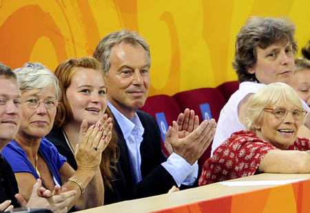 Former British Prime Minister Tony Blair (4th L) watches the cycling-track event during the Beijing 2008 Olympic Games at the Laoshan Velodrome in Beijing, China, Aug. 19, 2008.(Xinhua/Zhang Duo)