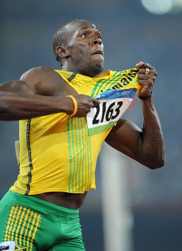 Usain Bolt of Jamaica clocked a new world record time of 19.30 seconds to win the Olympic 200m gold medal on Wednesday.