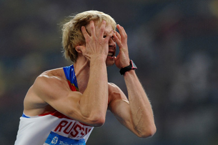 Andrey Silnov of Russia reacts during the men's high jump final at the National Stadium, also known as the Bird's Nest, during Beijing 2008 Olympic Games in Beijing, China, Aug. 19, 2008. Andrey Silnov won the gold with 2.36 metres . (Xinhua/Li Ga)
