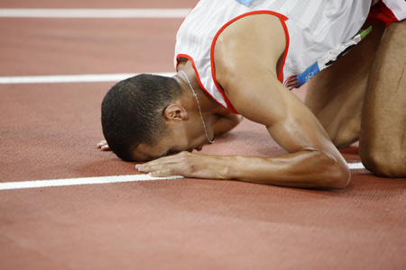 Rashid Ramzi of Bahrain reacts after winning the men's 1,500m final at the National Stadium, also known as the Bird's Nest, during Beijing 2008 Olympic Games in Beijing, China, Aug. 19, 2008. Rashid Ramzi won the gold. (Xinhua/Liao Yujie)