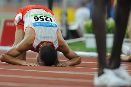 Rashid Ramzi of Bahrain reacts after winning the men's 1,500m final at the National Stadium, also known as the Bird's Nest, during Beijing 2008 Olympic Games in Beijing, China, Aug. 19, 2008. Rashid Ramzi won the gold. (Xinhua/Liao Yujie)