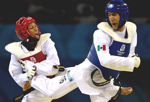 Mexican player Guillermo Perez claimed the title of men's 58kg taekwondo event on August 20 of 2008 with superiority ruled by referees, winning the country first gold at Beijing Olympics. [Xinhua]