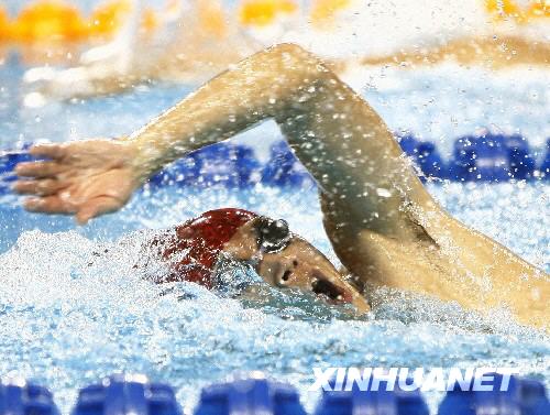 Chinese athlete Qian Zhenhua competes at 200m freestyle swimming of Modern Pentathlon, Yingdong Natatorium, August 21, 2008. [Xinhua]