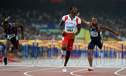 Cuba's world record holder Dayron Robles won the men's 110 meters hurdles gold medal at the Beijing Olympic Games on Thursday.