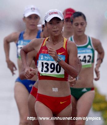 Liu Hong competes during women's 20km walk final at the National Stadium, also known as the Bird's Nest, during Beijing 2008 Olympic Games in Beijing, China, Aug. 21, 2008. Liu Hong finish the race in fourth place with 1:27:17. [Chen Jianli/Xinhua]