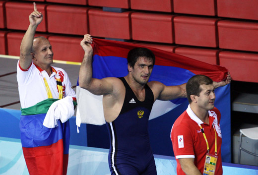 Shirvani Muradov from Russia claimed the men's freestyle 96kg wrestling title at the Beijing Olympics on August 21 of 2008, beating Taimuraz Tigiyev from Kazakhstan in the final. [Xinhua]