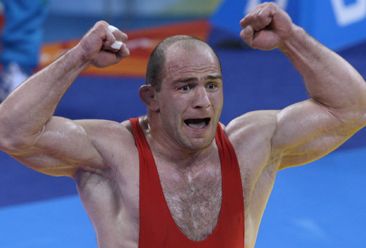 Artur Taymazov of Uzbekistan retained his Olympic title by winning the men's freestyle 120kg wrestling final at the Beijing Olympic on August 21 of 2008. Taymazov defeated Russian Bakhtiyar Akhmedov in the super heavyweight final 2-0 (3-0, 1-0) to bring down the curtain of wrestling events at the Beijing Olympics in the China Agricultural University Gymnasium. [Xinhua]