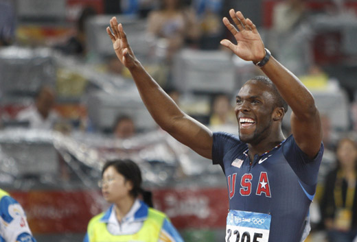 LaShawn Merritt led U.S. athletes to a 1-2-3 finish in the men's 400 meters at the Olympic Games here on August 21 of 2008. Defending champion Jeremy Wariner took the silver and David Neville won the bronze. [Xinhua]