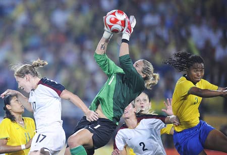 The U.S. goalkeeper Hope Solo grabs the ball during Women's Gold - Match 26 between the U.S. and Brazil of Beijing 2008 Olympic Games football event at Workers' Stadium in Beijing, China, Aug. 21, 2008. The U.S. beat Brazil 1-0 and won the gold medal of the event. 