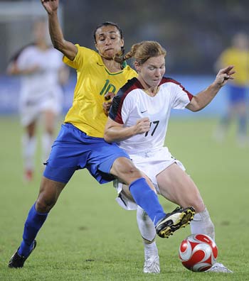 Marta (L) of Brazil vies for the ball during Women's Gold - Match 26 between the U.S. and Brazil of Beijing 2008 Olympic Games football event at Workers' Stadium in Beijing, China, Aug. 21, 2008. The U.S. beat Brazil 1-0 and won the gold medal of the event. 