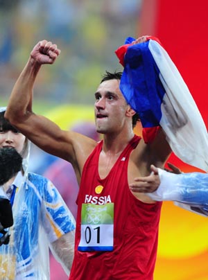 Andrey Moiseev of Russia celebrates after winning the gold medal of the men's modern pentathlon of the Beijing 2008 Olympic Games in Beijing, China, Aug 21, 2008. [Xinhua]