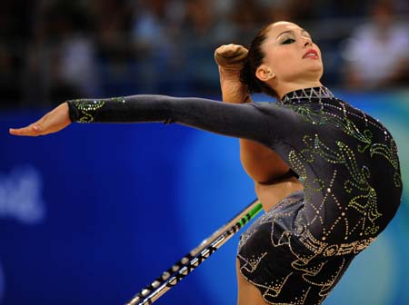 Irina Risenzon of Israel competes during the hoop contest of individual all-around qualification of Beijing Olympic Games gymnastics rhythmic event in Beijing, China, Aug. 21, 2008. [Chen Min/Xinhua]