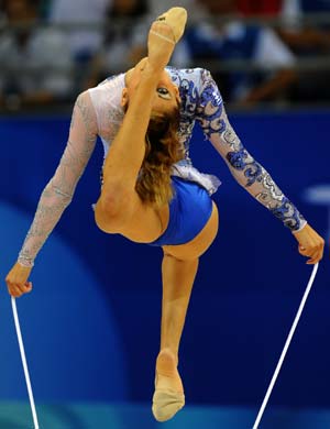 Eleni Andriola of Greece competes during the rope contest of individual all-around qualification of Beijing Olympic Games gymnastics rhythmic event in Beijing, China, Aug. 21, 2008. [Chen Min/Xinhua]