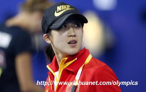 Chen Qian of China reacts during 10m air pistol shooting competition of the women's modern pentathlon at the Beijing Olympic Games in Beijing, China, Aug. 22, 2008. [Zhang Chen/Xinhua]