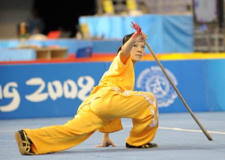 Chen Shao-Chi of Chinese Taipei performs during women's Qiangshu (spear play) of the Beijing 2008 Wushu Competition in Beijing, China, Aug. 21, 2008. Chen Shao-Chi ranked 4th in women's Qiangshu competition with a score of 9.50. (Xinhua/Chen Yehua)