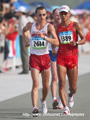 Poland's Grzegorz Sudol (L) competes with China's Si Tianfeng during men's 50km walk outside the National Stadium, also known as the Bird's Nest, during Beijing 2008 Olympic Games in Beijing, China, Aug. 22, 2008.[Liao Yujie/Xinhua]