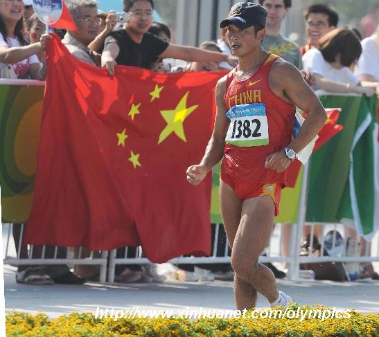 China's Zhao Chengliang competes during men's 50km walk outside the National Stadium, also known as the Bird's Nest, during Beijing 2008 Olympic Games in Beijing, China, Aug. 22, 2008. [Chen Kai/Xinhua]