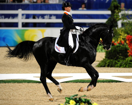Netherlandish rider Anky Van Grunsven rides her horse Salinero during the dressage individual grand prix freestyle of the Beijing 2008 Olympic Games equestrian events in Hong Kong, China, Aug. 19, 2008. Anky Van Grunsven won the gold medal of the event with the score of 78.680. [Lo Ping Fai/Xinhua]