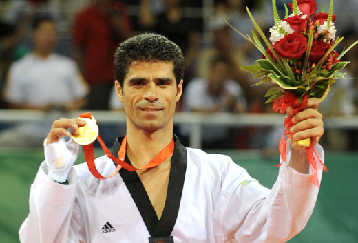 Iranian taekwondo player Hadi Saei clinched his second Olympic taekwondo gold on August 22 of 2008, beating Mauro Sarmiento of Italy 6-4 in the men's 80kg category. [Xinhua]