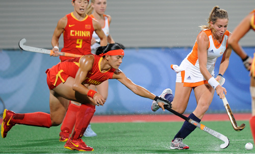 World champions the Netherlands snatched the Olympic women's hockey gold with a 2-0 win over China on Friday.