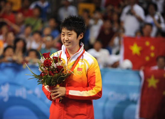 World No.1 Zhang Yining won her fourth Olympic gold, beating teammate Wang Nan 4-1 in an all-Chinese women's singles table tennis Olympic final on Friday evening. Guo failed to reach the final because of her 4-2 loss to 'Big Sister' Wang, who is going to retire and determined to win as much as possible at her last Olympic Games. [Xinhua]