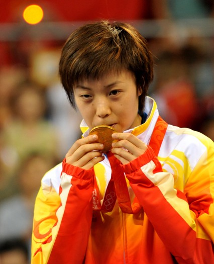World No.1 Zhang Yining won her fourth Olympic gold, beating teammate Wang Nan 4-1 in an all-Chinese women's singles table tennis Olympic final on Friday evening. Guo failed to reach the final because of her 4-2 loss to 'Big Sister' Wang, who is going to retire and determined to win as much as possible at her last Olympic Games. [Xinhua]