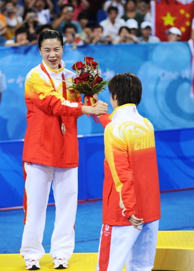 World No.1 Zhang Yining won her fourth Olympic gold, beating teammate Wang Nan 4-1 in an all-Chinese women's singles table tennis Olympic final on Friday evening. Guo failed to reach the final because of her 4-2 loss to 'Big Sister' Wang, who is going to retire and determined to win as much as possible at her last Olympic Games. [Xinhua]