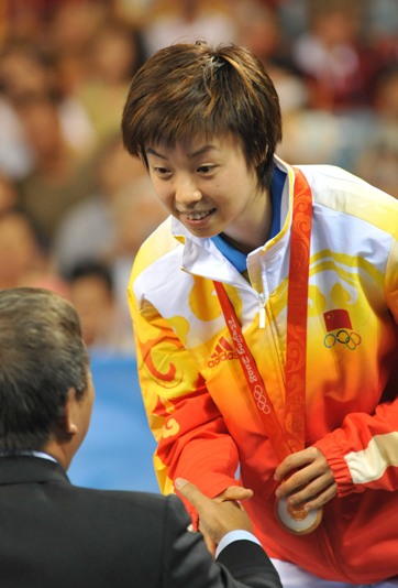 World No.1 Zhang Yining won her fourth Olympic gold, beating teammate Wang Nan 4-1 in an all-Chinese women's singles table tennis Olympic final on Friday evening. Guo failed to reach the final because of her 4-2 loss to 'Big Sister' Wang, who is going to retire and determined to win as much as possible at her last Olympic Games. [Xinhua]