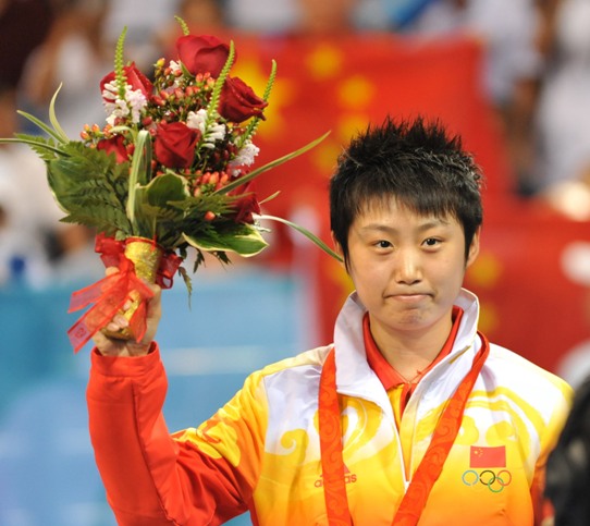 World No.1 Zhang Yining won her fourth Olympic gold, beating teammate Wang Nan 4-1 in an all-Chinese women's singles table tennis Olympic final on Friday evening. Guo failed to reach the final because of her 4-2 loss to 'Big Sister' Wang, who is going to retire and determined to win as much as possible at her last Olympic Games. [Xinhua]