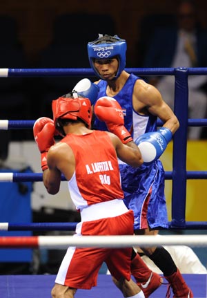 Somjit Jongjohor from Thailand claimed the men's 51kg boxing title at the Beijing Olympics on Saturday, beating Andris Laffita Hernandez from Cuba 8-2 in the final. 