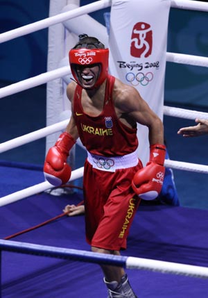 Vasyl Lomachenko of Ukraine reacts during Men's Feather (57kg) Final Bout between Vasyl Lomachenko of Ukraine and Khedafi Djelkhir of France of Beijing 2008 Olympic Games boxing event at Workers' Gymnasium in Beijing, China, Aug. 23, 2008. Vasyl Lomachenko defeated Khedafi Djelkhir, and won the gold medal of the event.