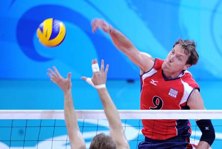  Ryan Millar of the United States spikes the ball during men's volleyball gold medal match against Brazil at the Beijing Olympic Games in Beijing, China, Aug. 24, 2008. The United States beat Brazil 3-1 and won the gold.