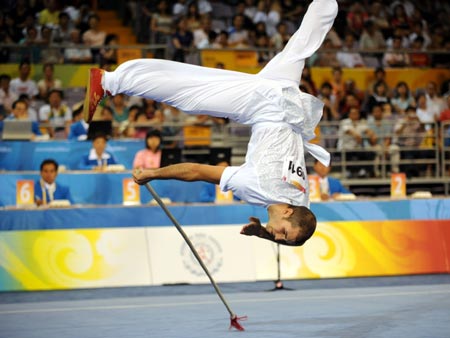 Pierre Rouviere of France performs in the men's Qiangshu competition of Beijing 2008 Wushu tournament, in Beijing, China, Aug. 23, 2008. He ranked eighth in the event with a score of 9.21 points. [Xinhua]