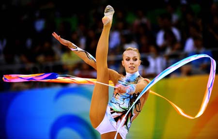 Inna Zhukova of Belarus competes with the ribbon during the individual all-round final at the Beijing 2008 Olympic Games rhythmic gymnastics event in Beijing, China, Aug. 23, 2008. Inna Zhukova won the silver medal of the event.[Xinhua]