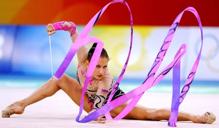 Simona Peycheva of Bulgaria competes with the ribbon during the individual all-round final at the Beijing 2008 Olympic Games rhythmic gymnastics event in Beijing, China, Aug. 23, 2008. Simona Peycheva ranked 10th in the event.[Xinhua]