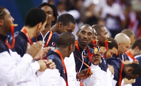 Players of the U.S. attends the awarding ceremony of Beijing 2008 Olympic Games men's basketball event at Olympic Basketball Gymnasium in Beijing, China, Aug. 24, 2008. The U.S. beat Spain 118-107 and won the gold medal of the event.