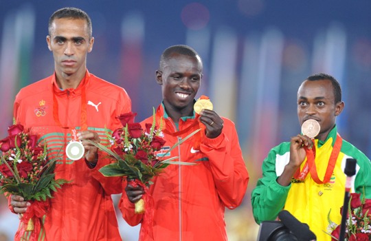 The last three medals of the Beijing Olympic Games were awarded to winners of men&apos;s marathon at the Games&apos; closing ceremony staged in the National Stadium. [Xinhua]