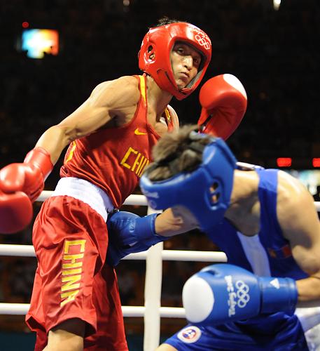 Light flyweight (48kg) boxer Zou Shiming wins China's first boxing Olympic gold medal by beating Mongolia's Serdamba Purevdorj 1-0 at the Beijing Olympics on Sunday.